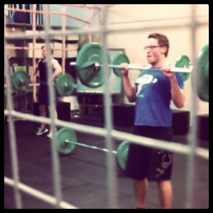 Brad cleaning in the cage